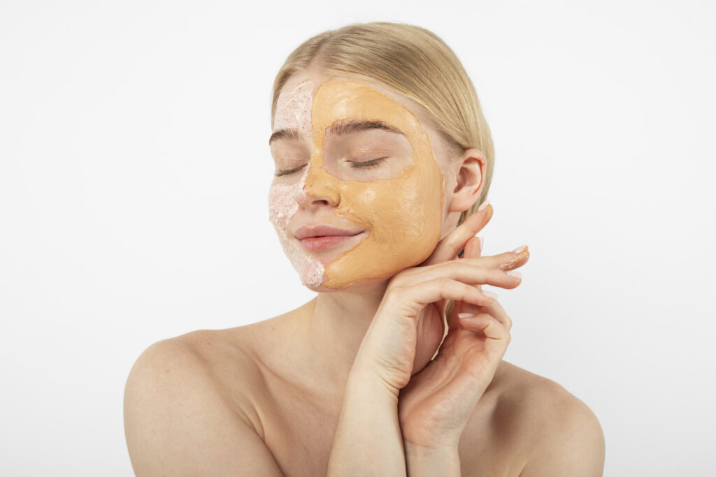 close up smiley woman with face treatment